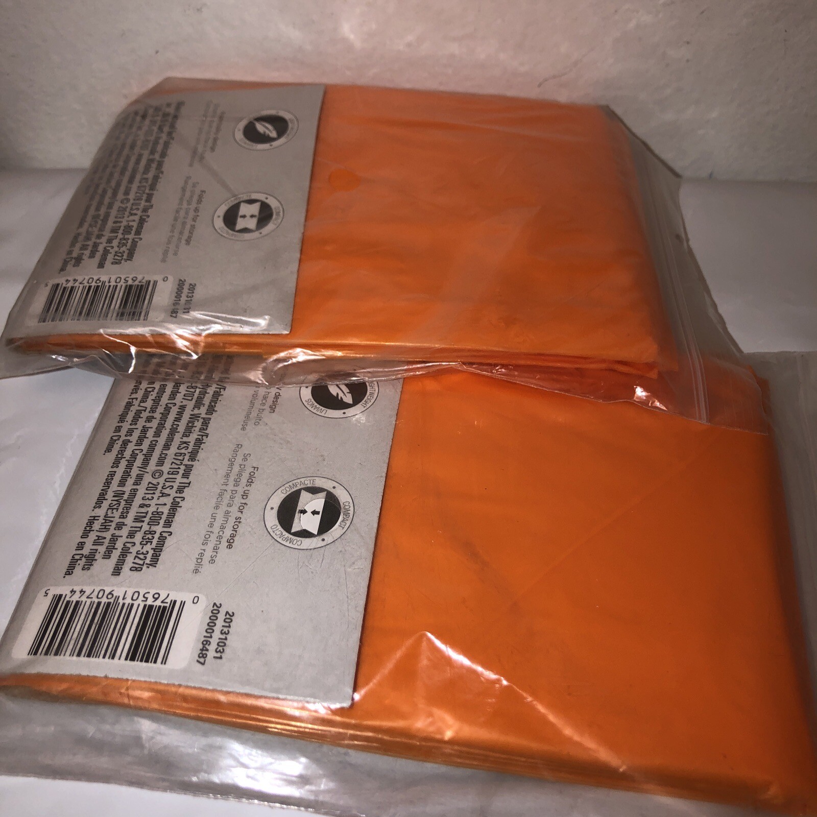 Lot Of 2 ” NIP ” Coleman Orange Disposable Ponchos One Size Fits All. 2013