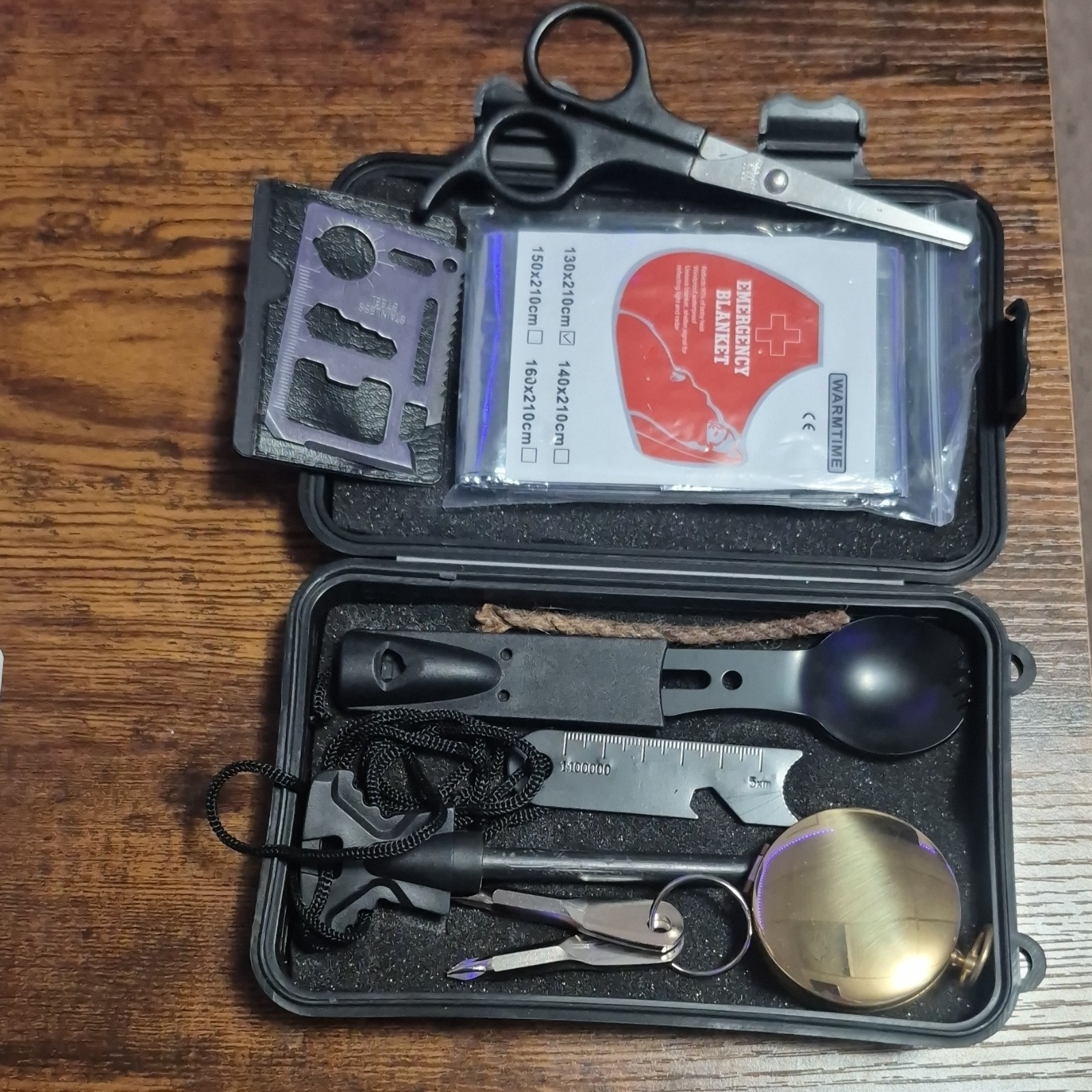 Survival Kit with Emergency Blanket, Multipurpose Tool, Fire Starter, Compass