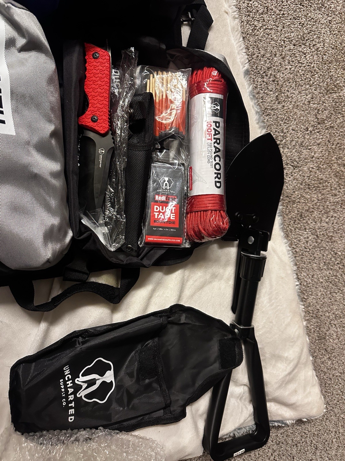 Uncharted Supply Co. Waterproof Survival Kit First Aid Fire Starter Multi-tool
