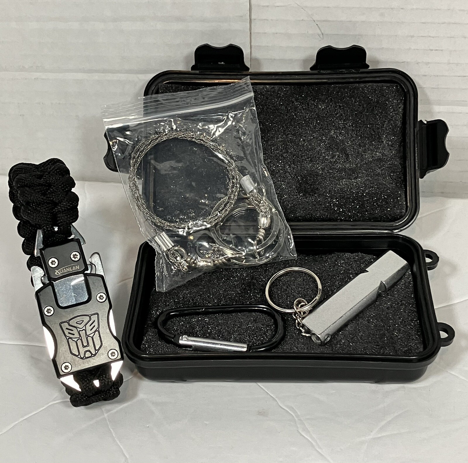 Small Survival Kit for Hiking Camping Survivor Gear Paracord Whistle Sawchain