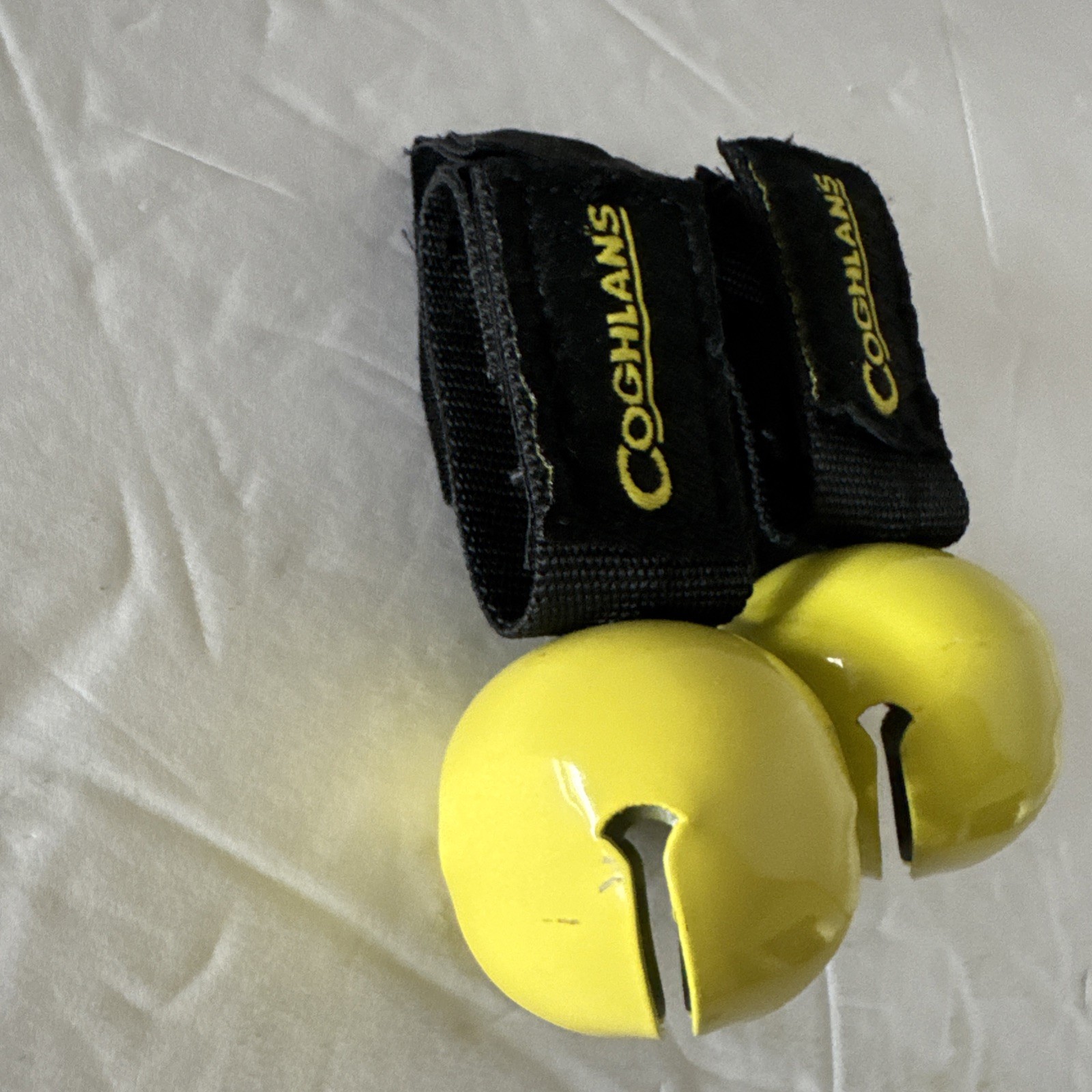 Coghlan’s Bear Bell with magnetic silencer .. Yellow with black trim .. New