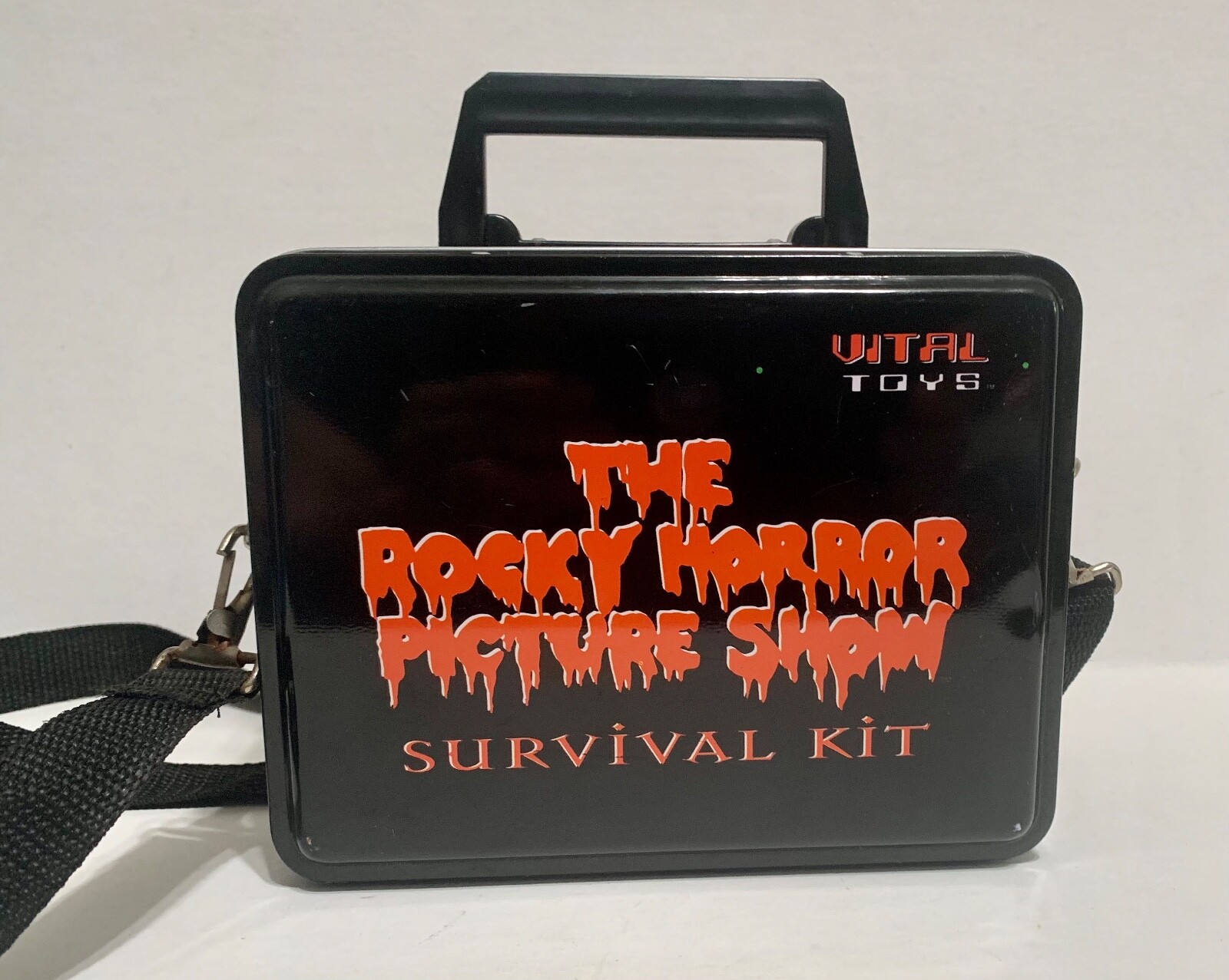 Collectible “The Rocky Horror Picture Show” 25th Anniversary Metal Survival Kit