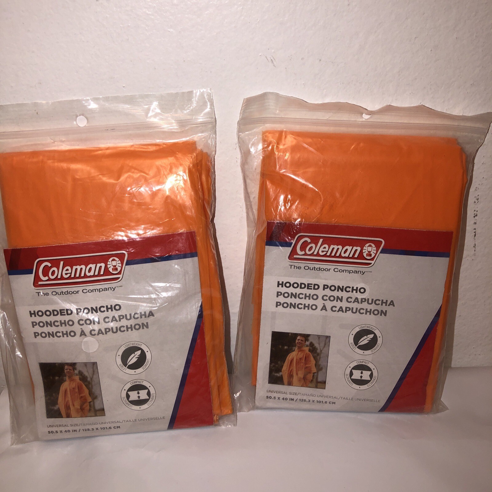 Lot Of 2 ” NIP ” Coleman Orange Disposable Ponchos One Size Fits All. 2013