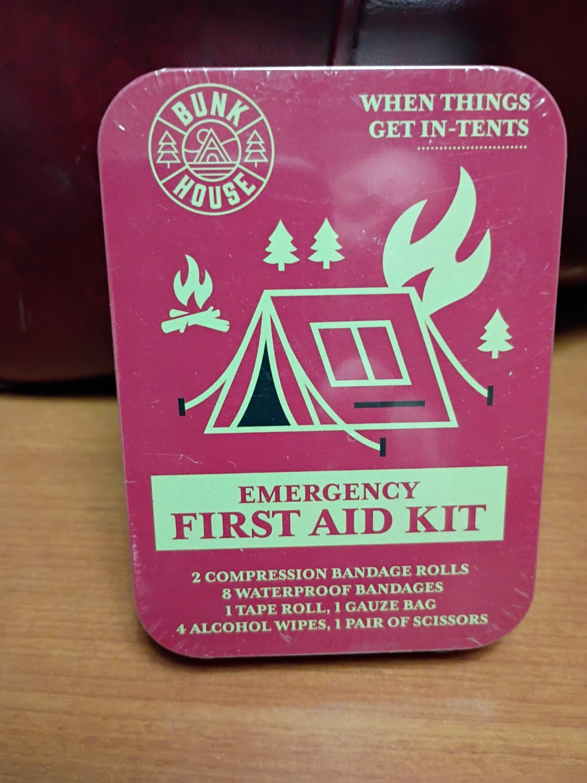 Bunkhouse branded emergency first aid kit featuring a graphic of a tent and…