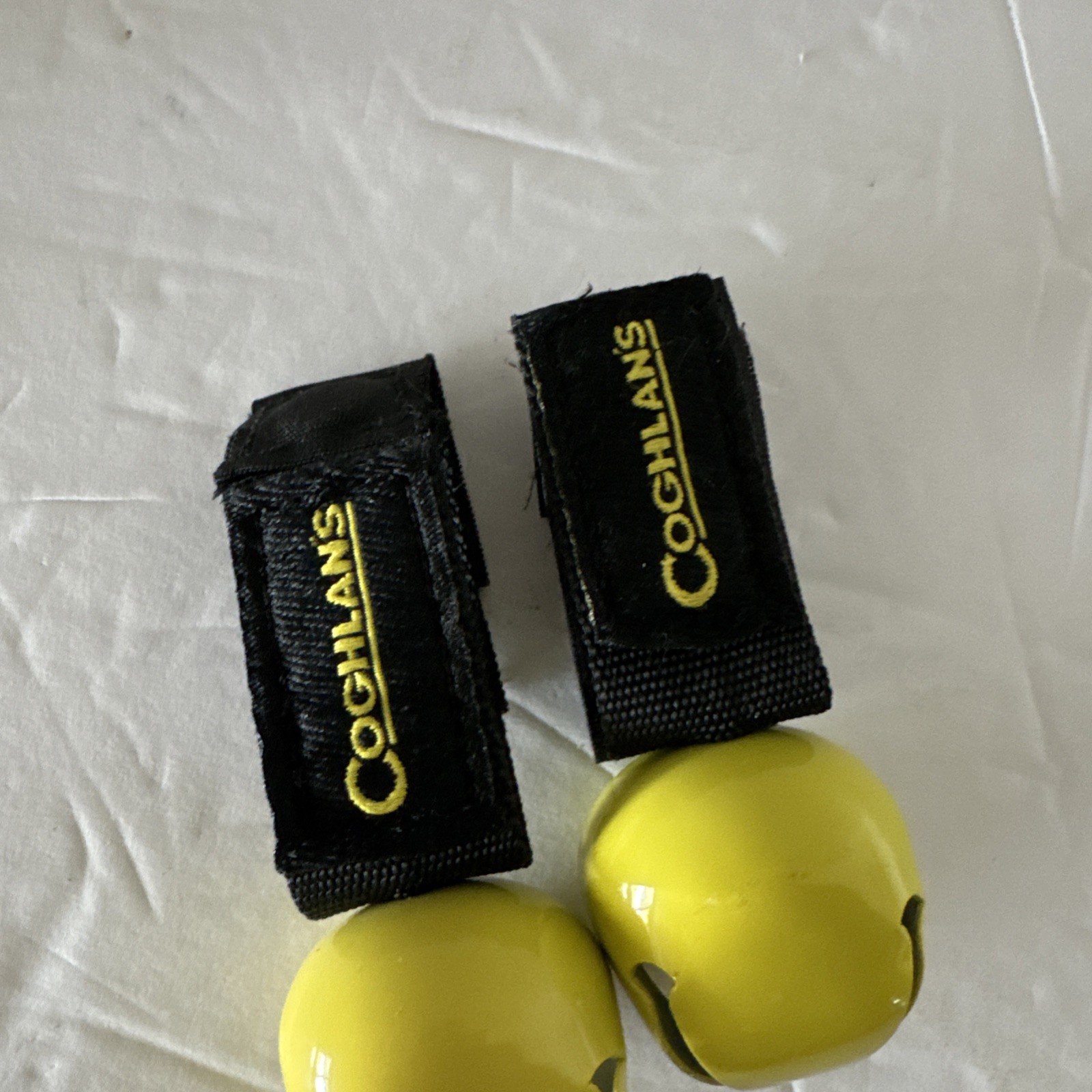 Coghlan’s Bear Bell with magnetic silencer .. Yellow with black trim .. New