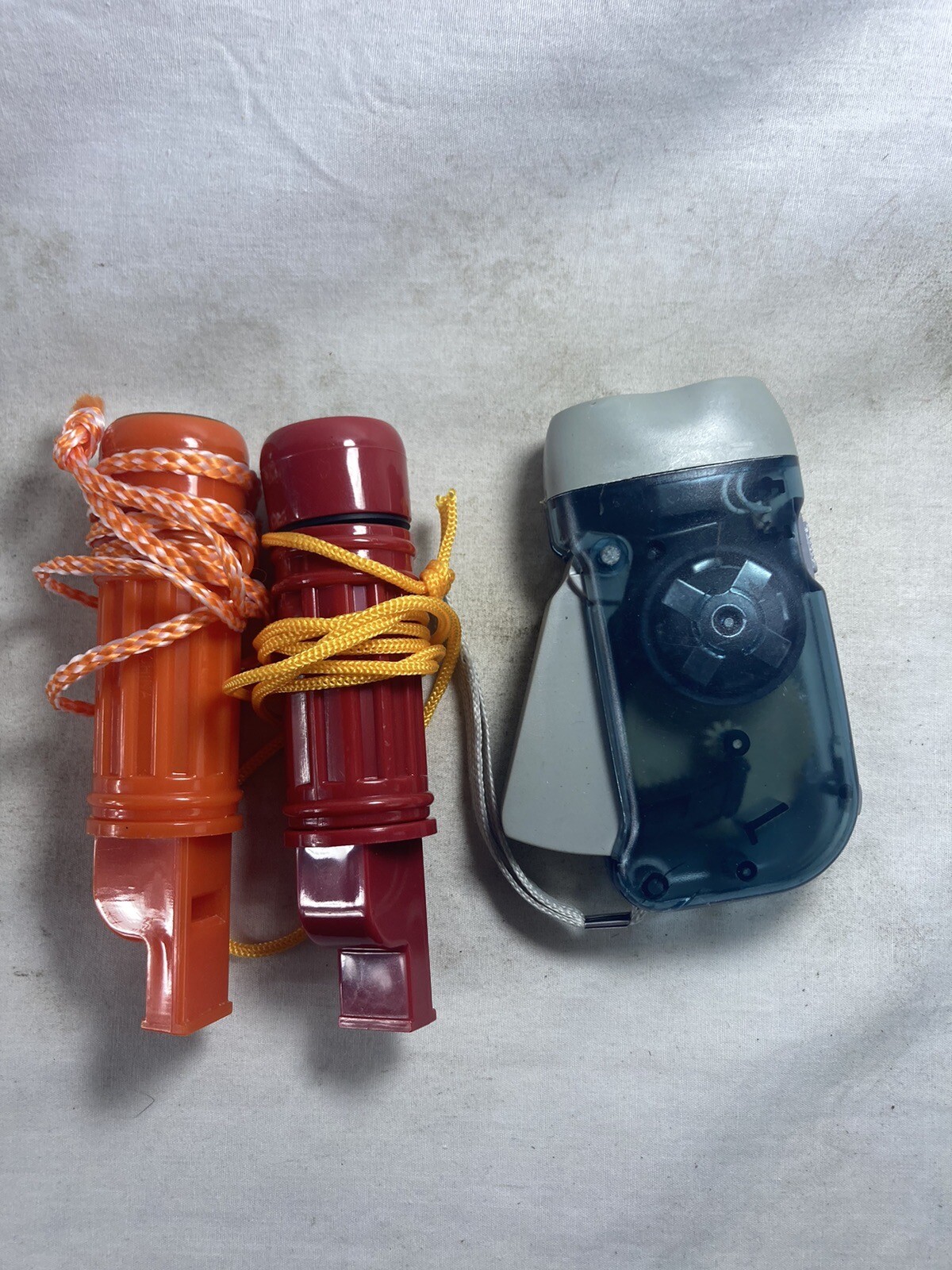 Two Survival Compass, Whistle + Match Holder And Wind Up Survival Flashlight