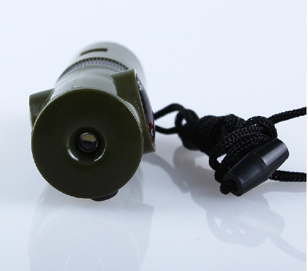 7-In-1 Emergency Survival Whistle Compass Thermometer LED Flashlight Magnifier