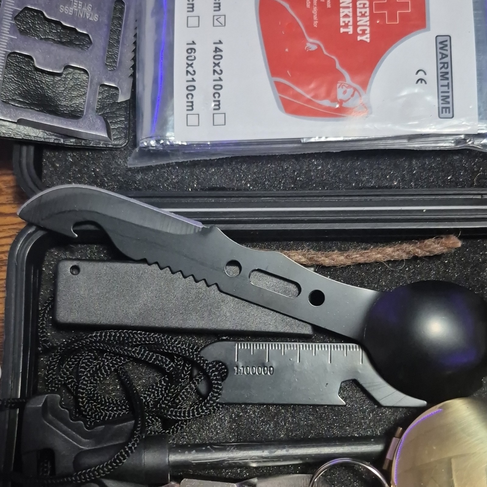 Survival Kit with Emergency Blanket, Multipurpose Tool, Fire Starter, Compass