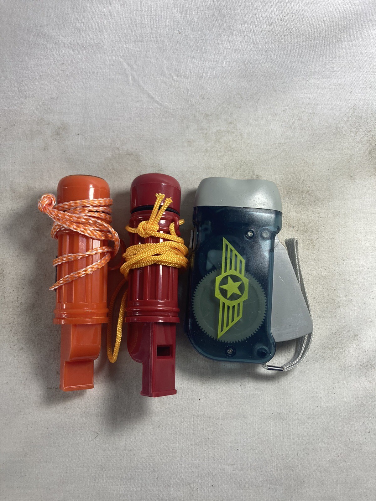 Two Survival Compass, Whistle + Match Holder And Wind Up Survival Flashlight