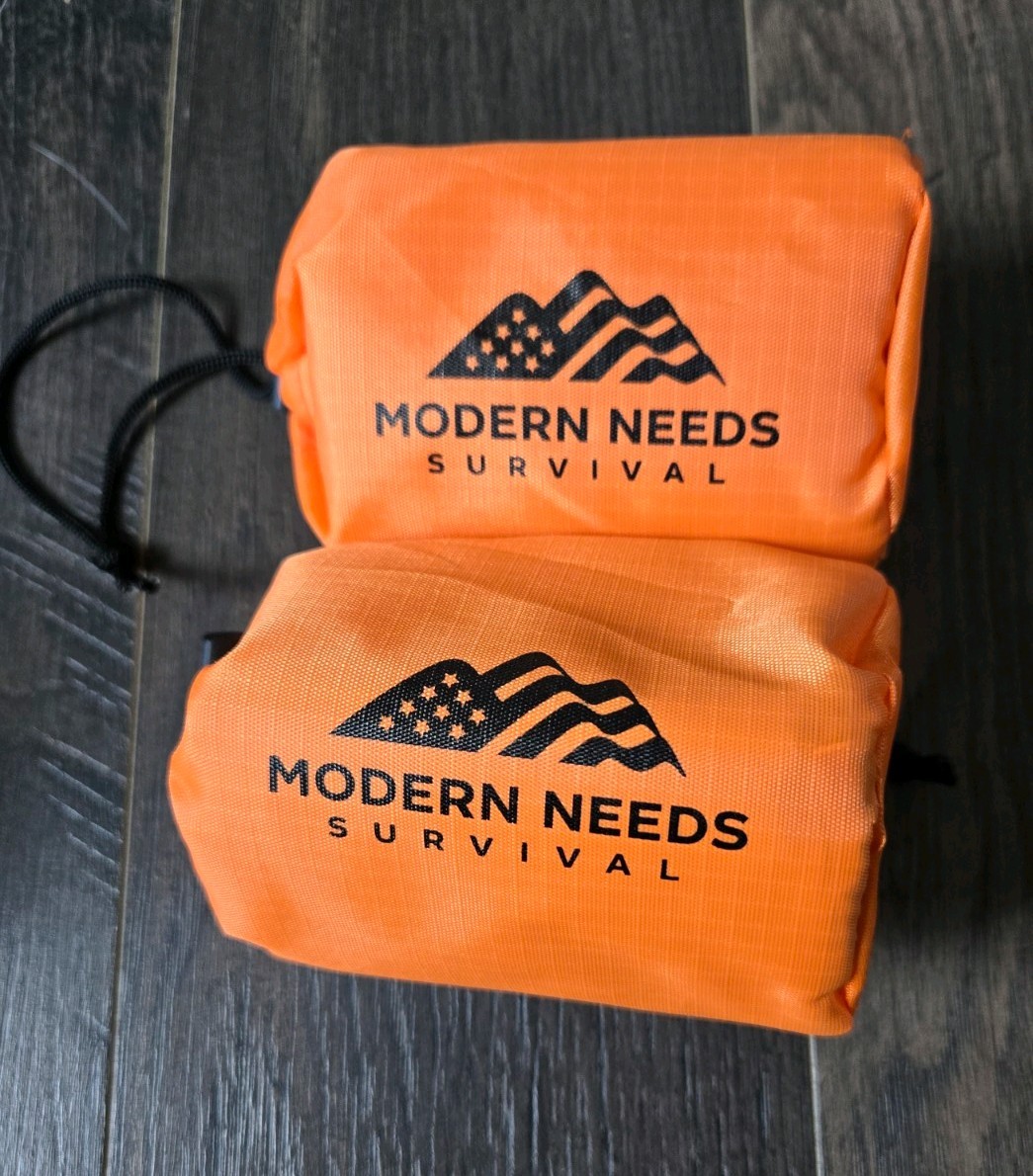 Modern Needs Survival Kit. Emergency Sleeping Bags (2) And A Ready Filter Straw
