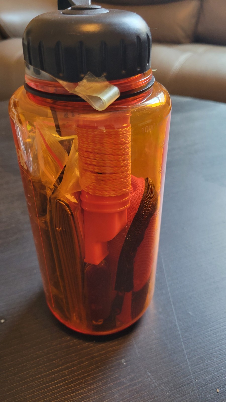 Eddie Bauer Essential Survival Kit within a 32 oz Water Bottle Orange Unopened