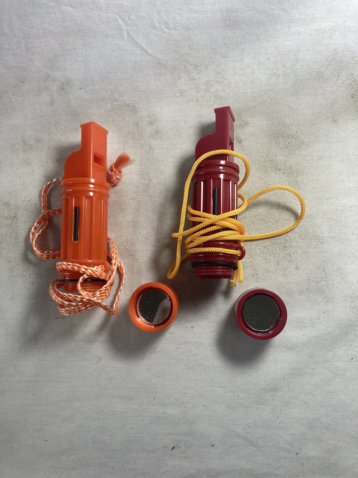 Two Survival Compass, Whistle + Match Holder And Wind Up Survival Flashlight