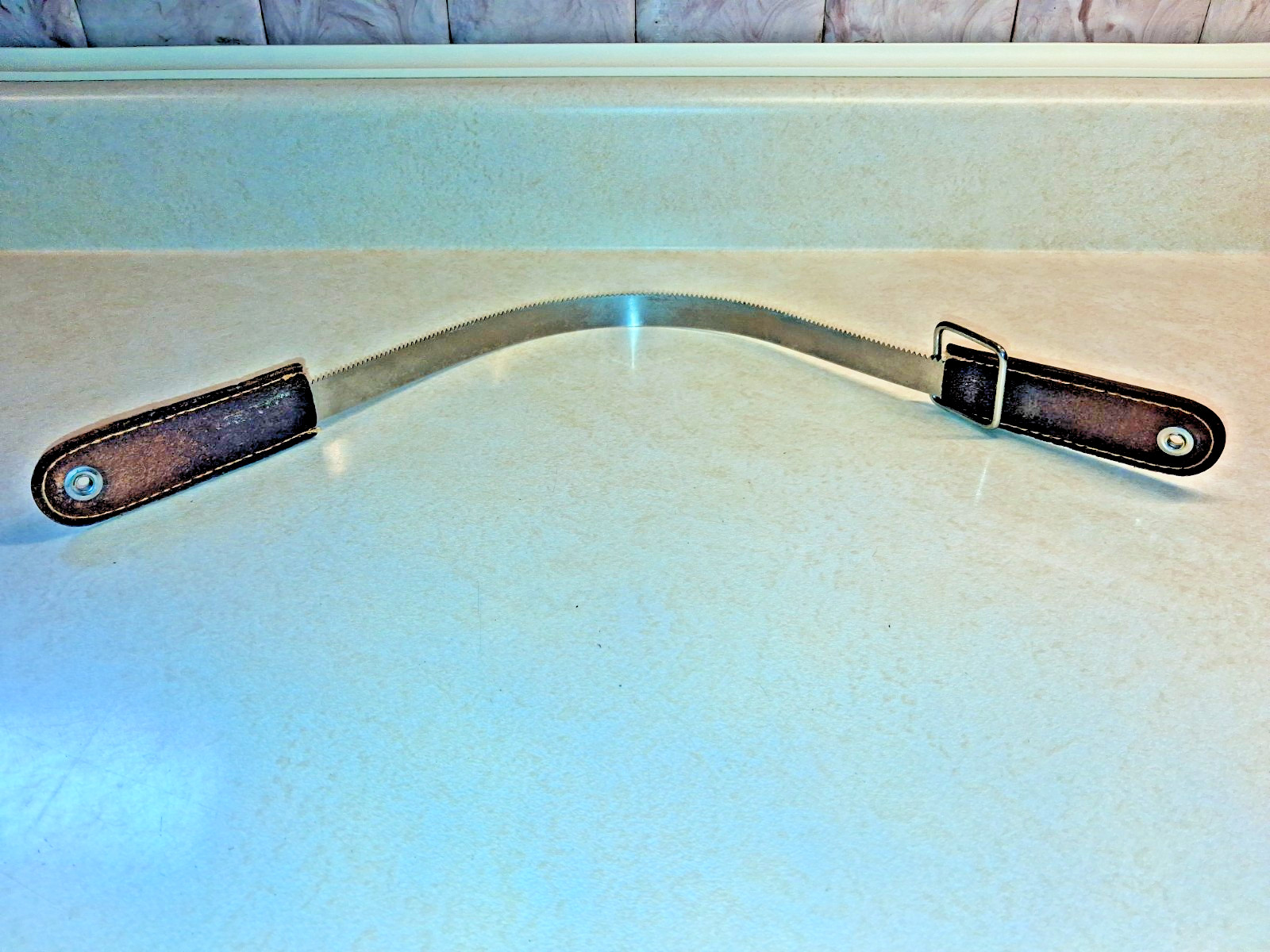 Vintage (NOS) 22″ long, Flexible, Leather Handles, Survival Brush Cutting Tool