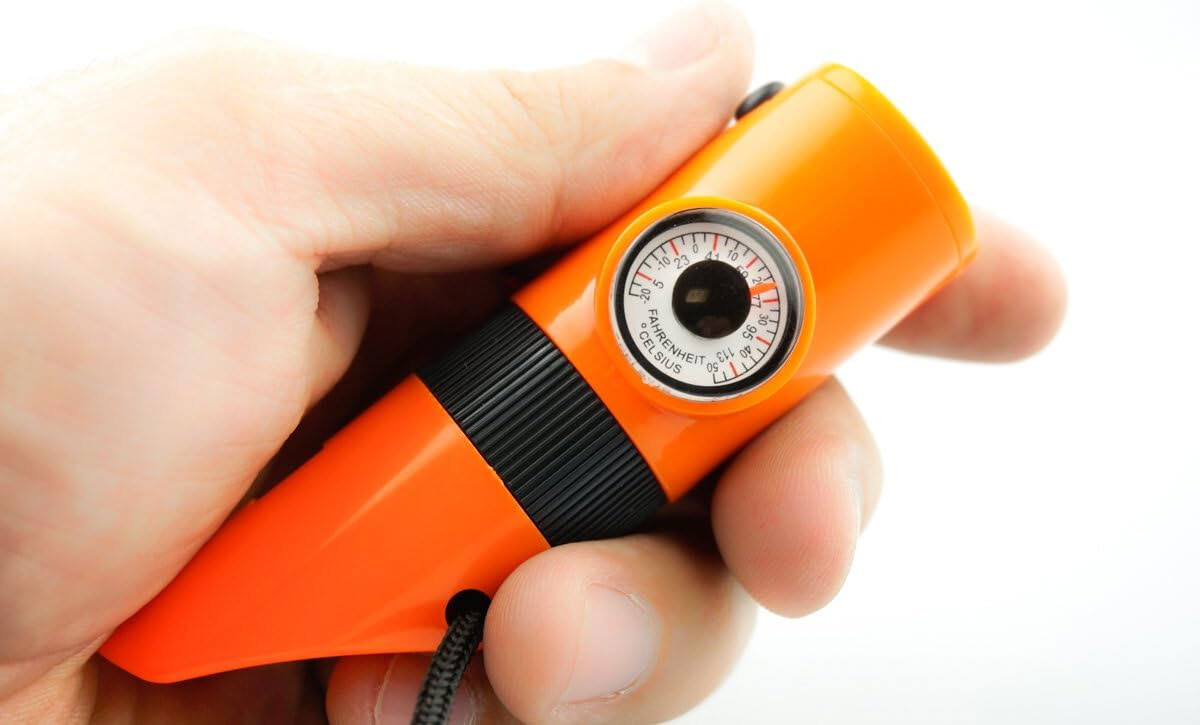 7-In-1 Emergency Survival Whistle Compass Thermometer LED Flashlight Magnifier