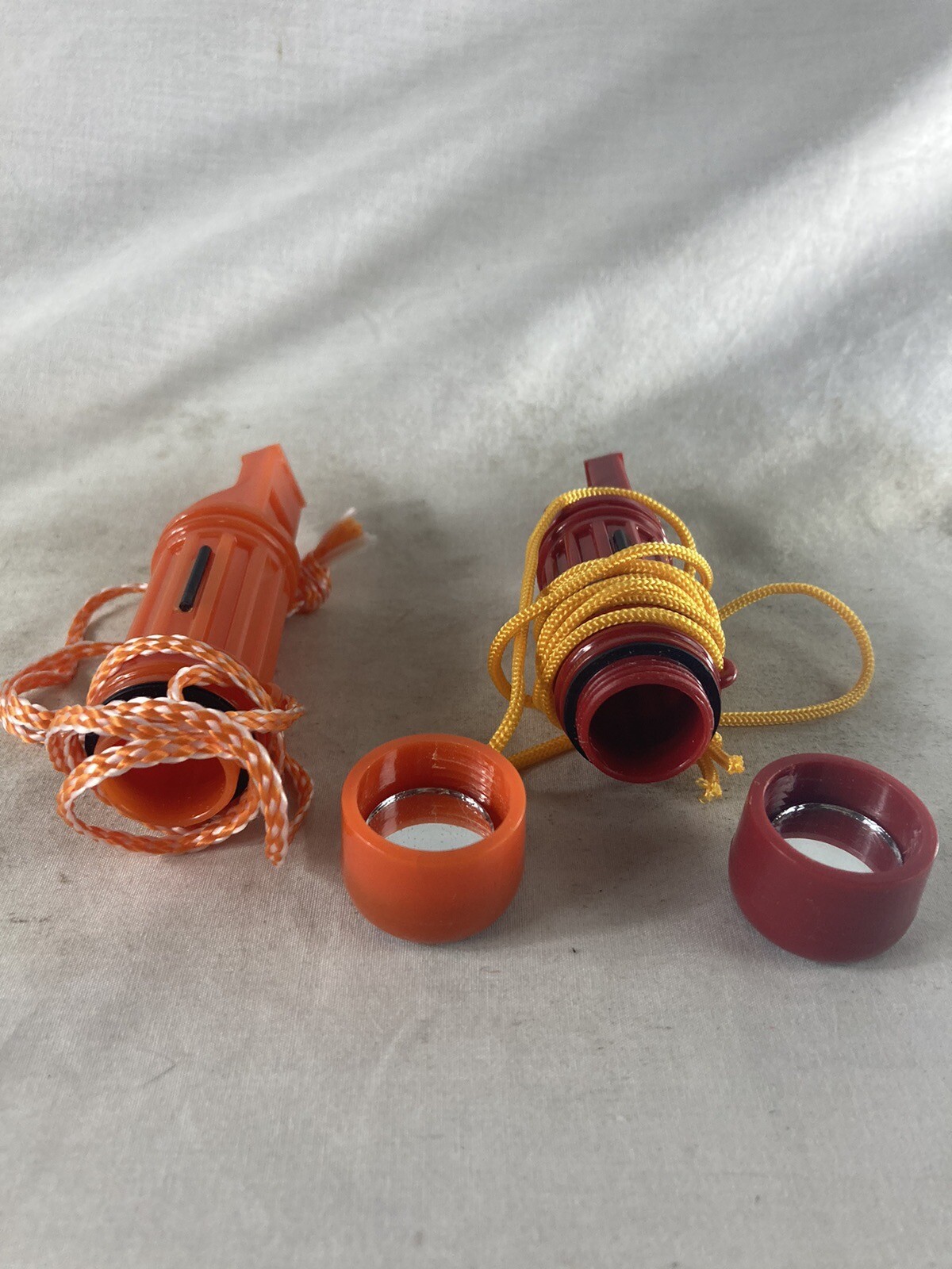 Two Survival Compass, Whistle + Match Holder And Wind Up Survival Flashlight