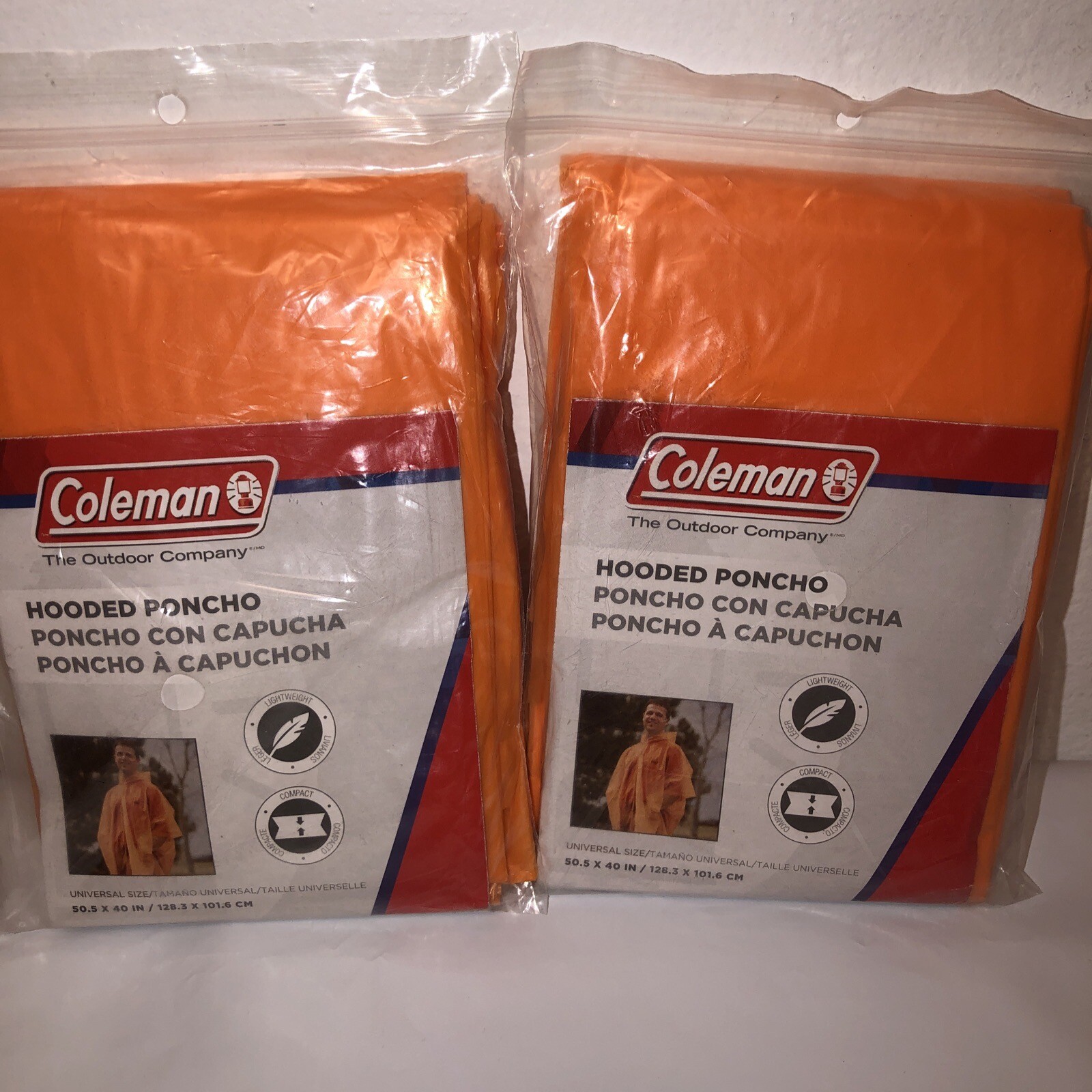 Lot Of 2 ” NIP ” Coleman Orange Disposable Ponchos One Size Fits All. 2013