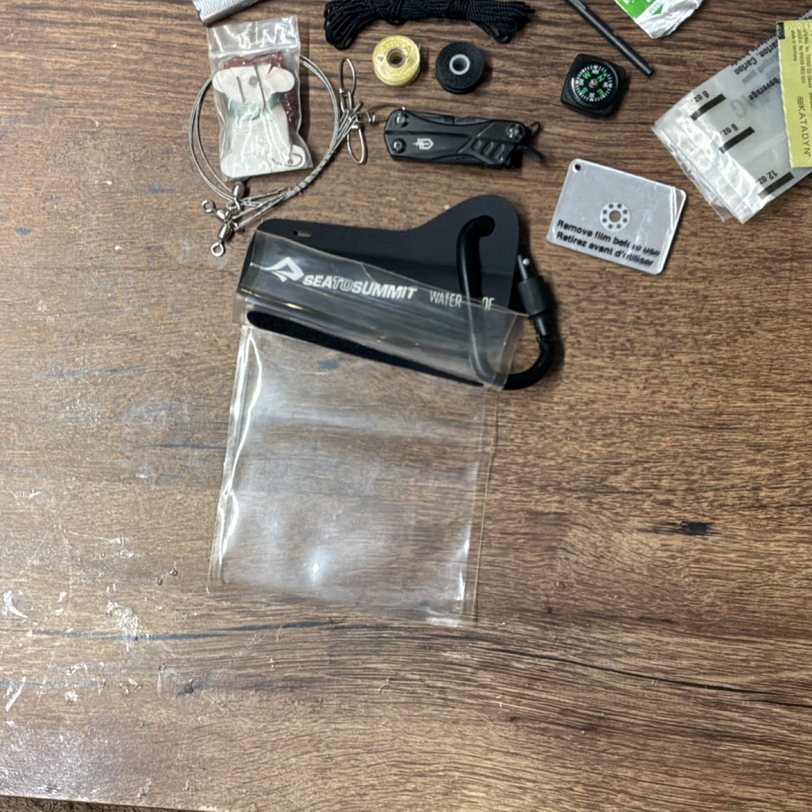 Waterproof Survival Kit with First Aid Guide, Compass, Multi-tool & Much More