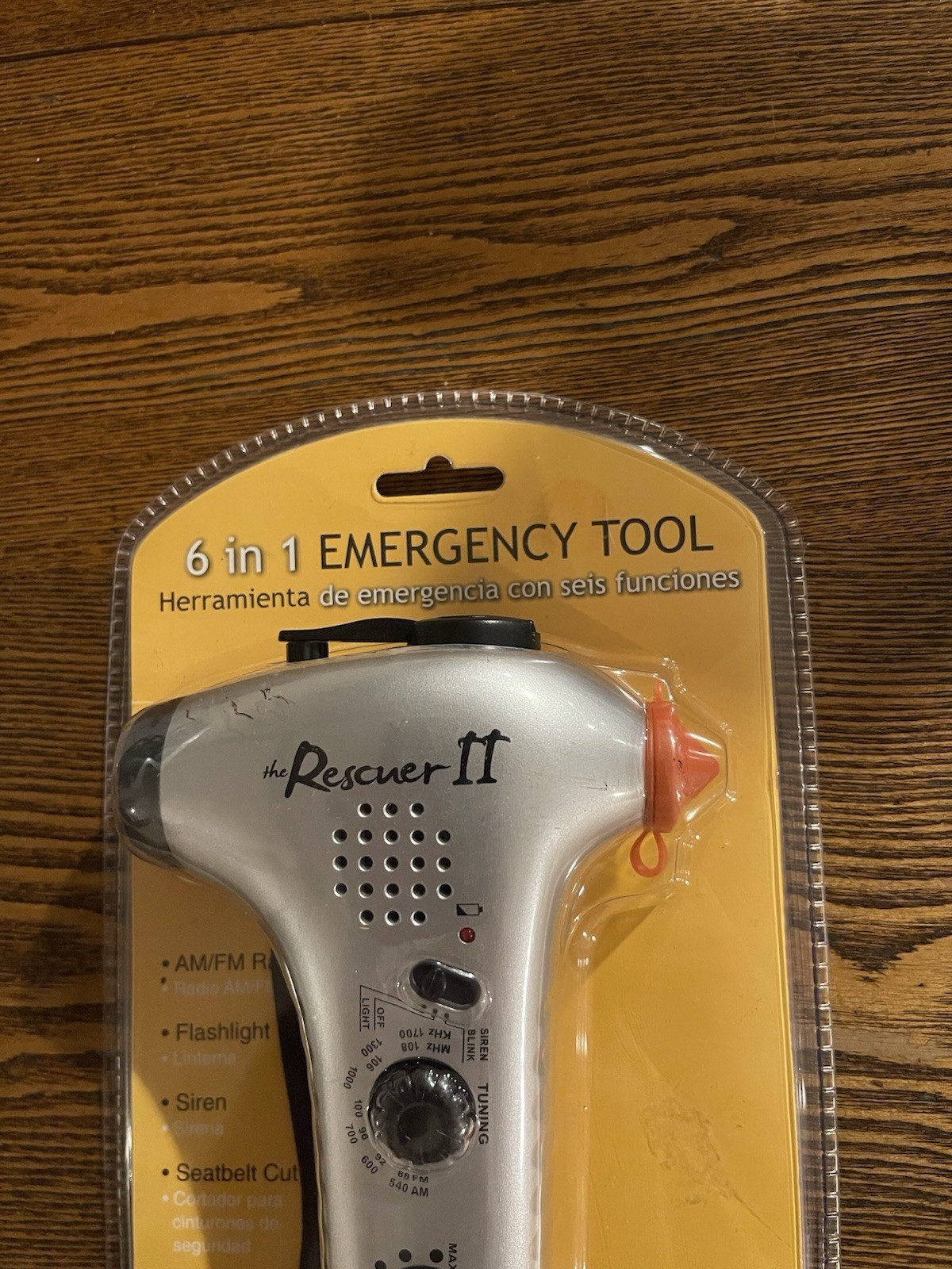 6 In 1 Emergency Tool. Am/Fm Radio Flashlight Siren Seatbelt Cutter and More