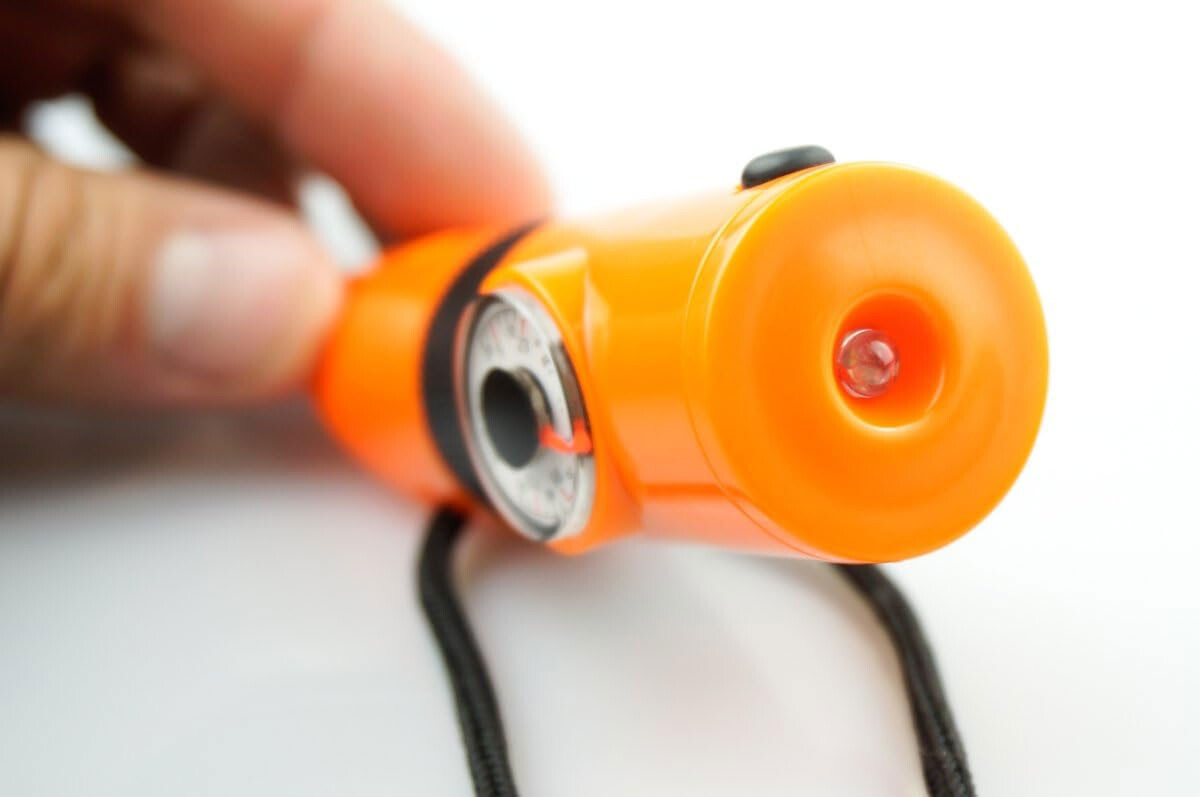 7-In-1 Emergency Survival Whistle Compass Thermometer LED Flashlight Magnifier