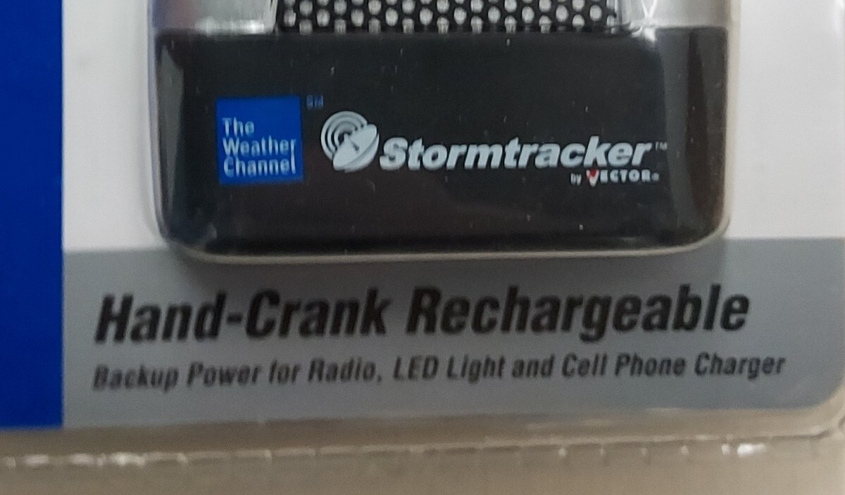 NOS Storm Tracker Weather Alert Radio Flashlight Cell Phone Charger Am/Fm Vector