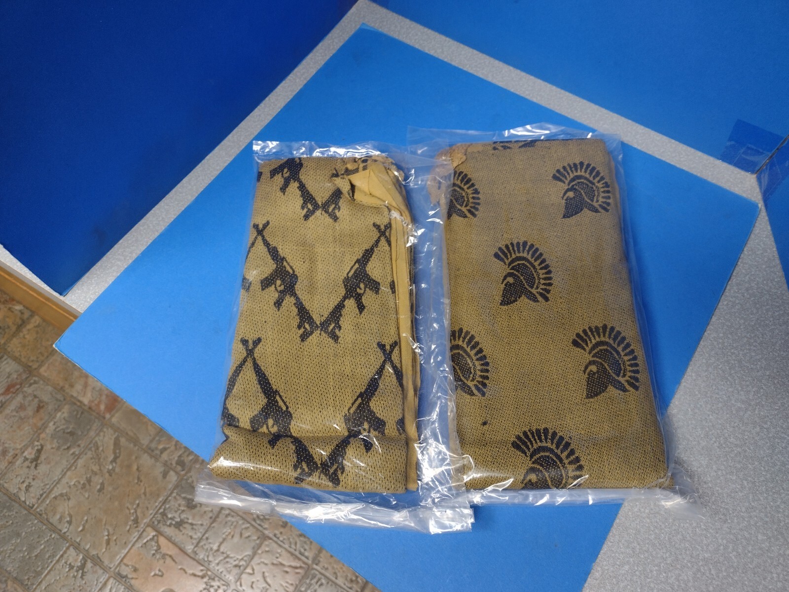 SET OF 2 SHEMAGH SCARVES RIFLES TROJAN HEADS DESIGNS DESERT TAN COLOR