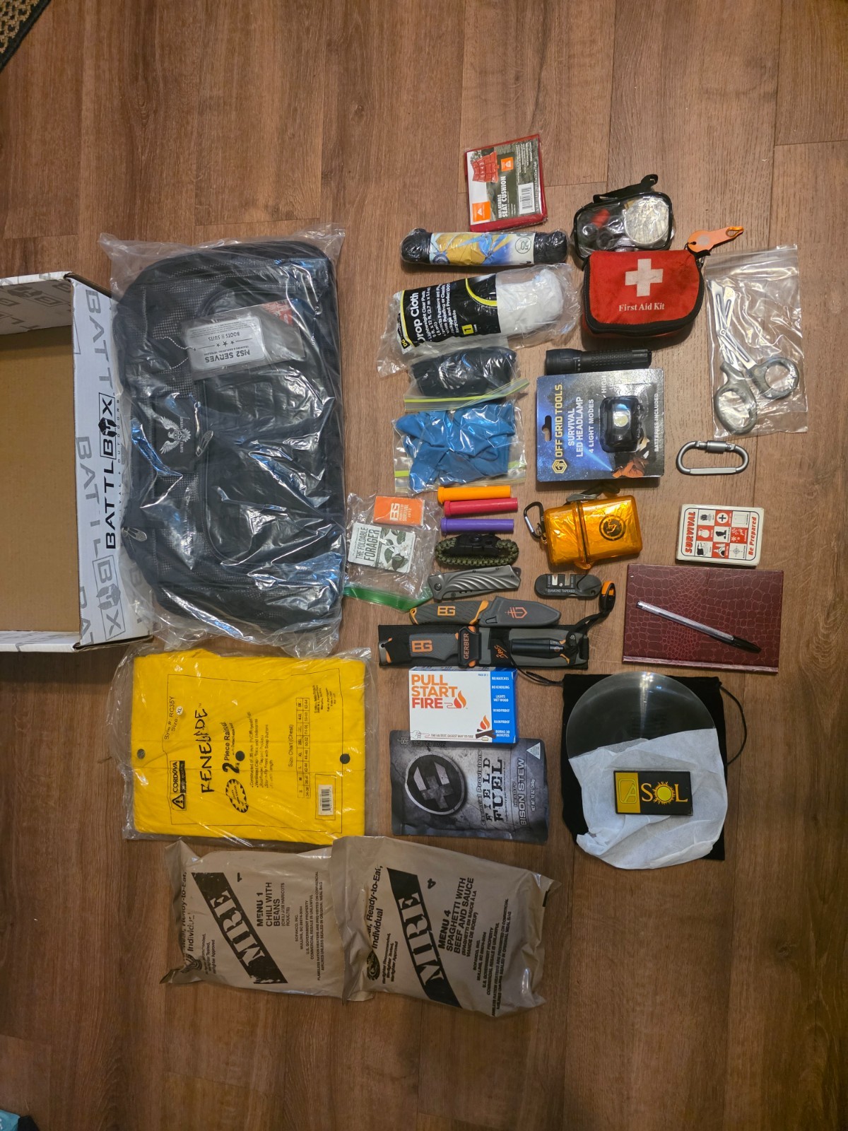Bug Out Go Bag Survival Kit BG Gerber knife 2 MRE full rain gear Headlamp fire
