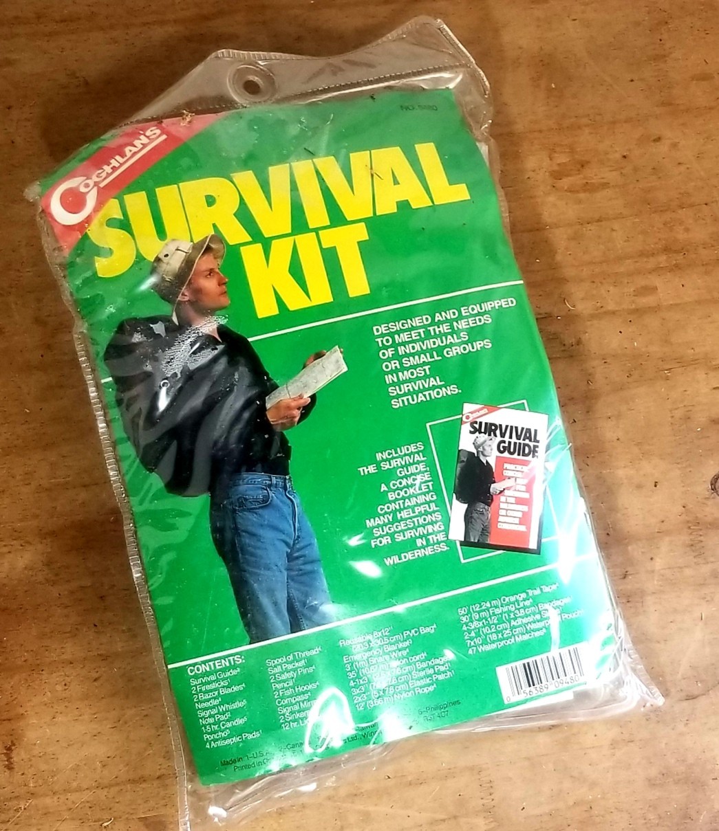 Coghlans Survival Kit With Fishing, Band-Aids, Cord, Fire Sticks, Lots Of Other