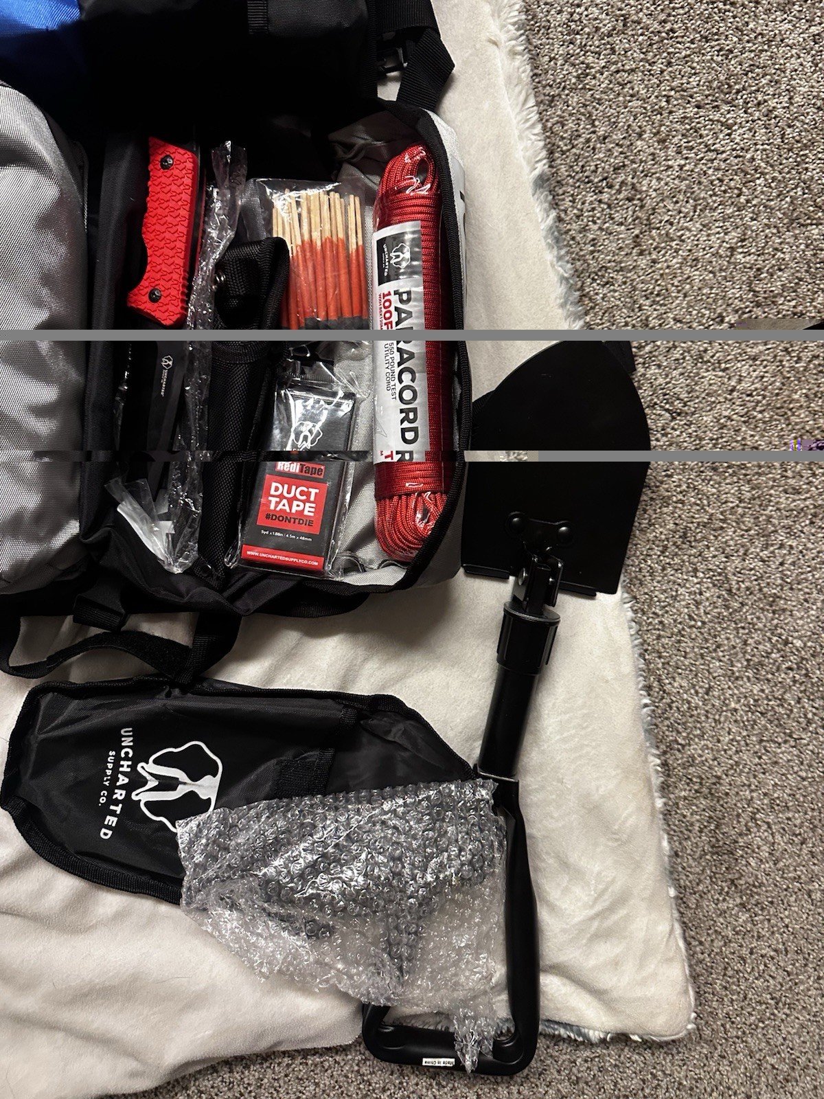 Uncharted Supply Co. Waterproof Survival Kit First Aid Fire Starter Multi-tool